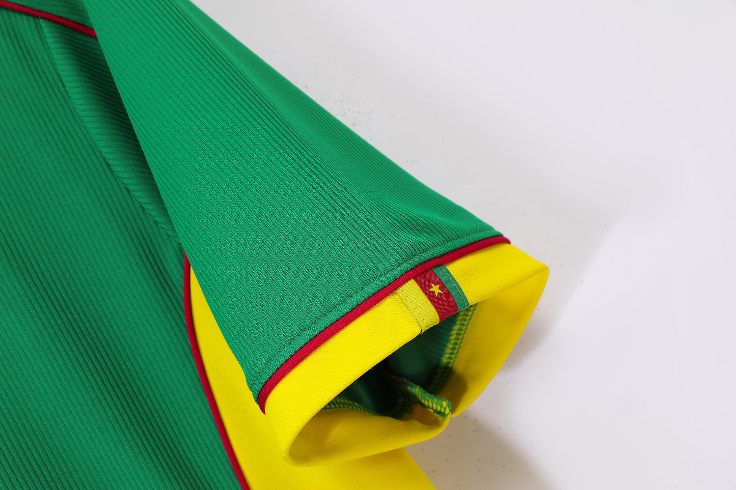 Camiseta Camerún Puma Local 2002–2004 – Verde/Amarillo – Leones Indomables