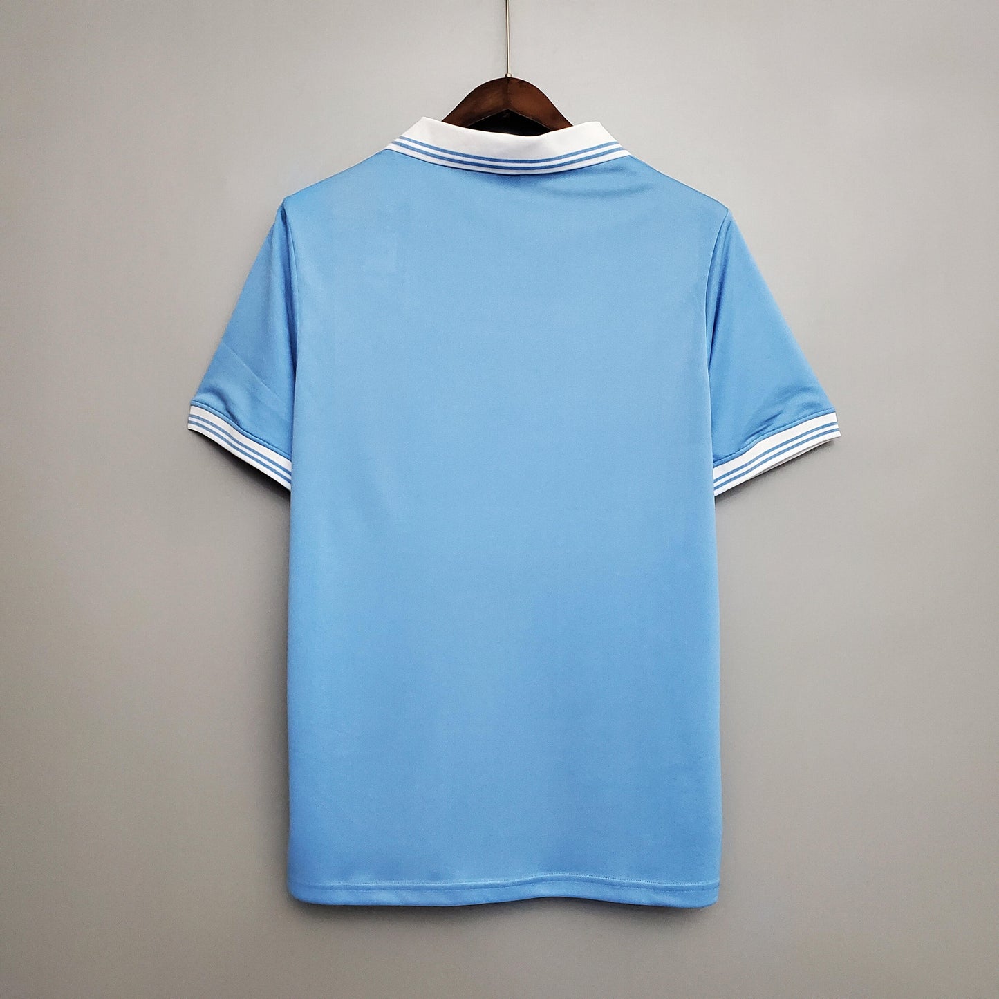 SSC Napoli “Buitoni” Scudetto 1987–88 — Camiseta home celeste (cuello blanco)