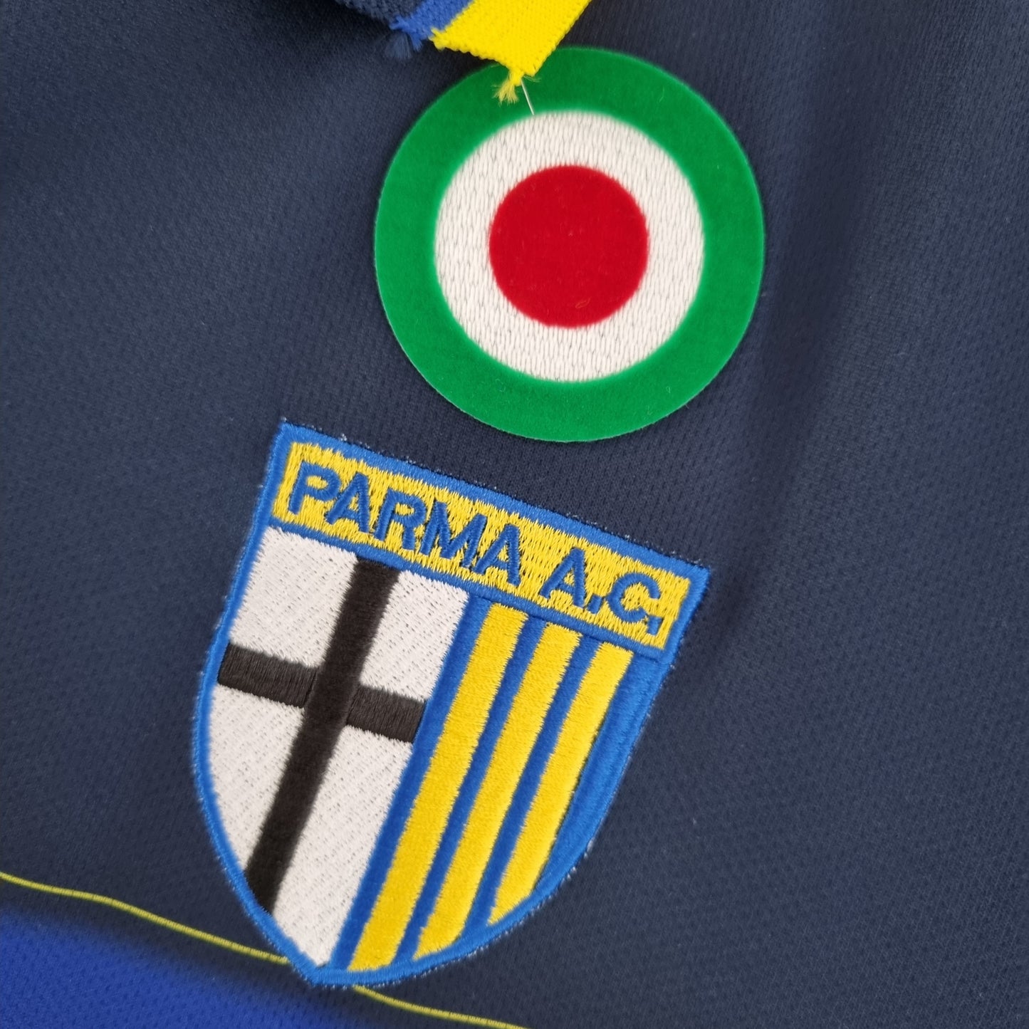 Parma 1999–00 “Parmalat” — Camiseta away Champion azul marino (coccarda Coppa Italia)