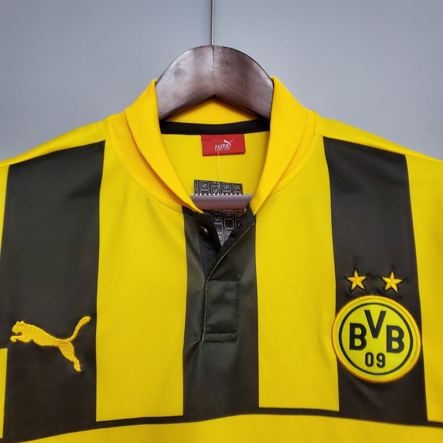 Borussia Dortmund “Evonik” 2016–17 — Camiseta home Puma amarilla/negra (rayas verticales)