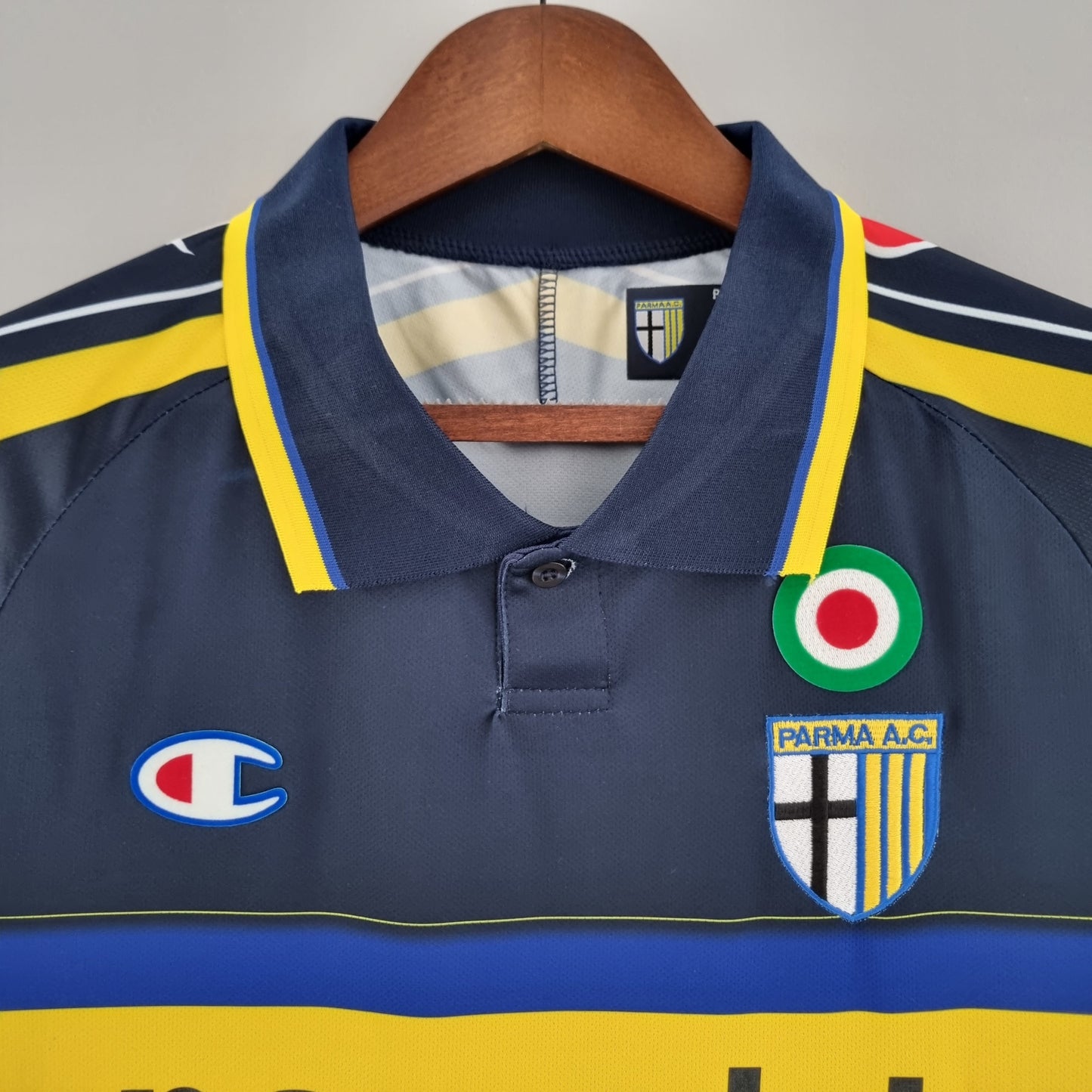 Parma 1999–00 “Parmalat” — Camiseta away Champion azul marino (coccarda Coppa Italia)