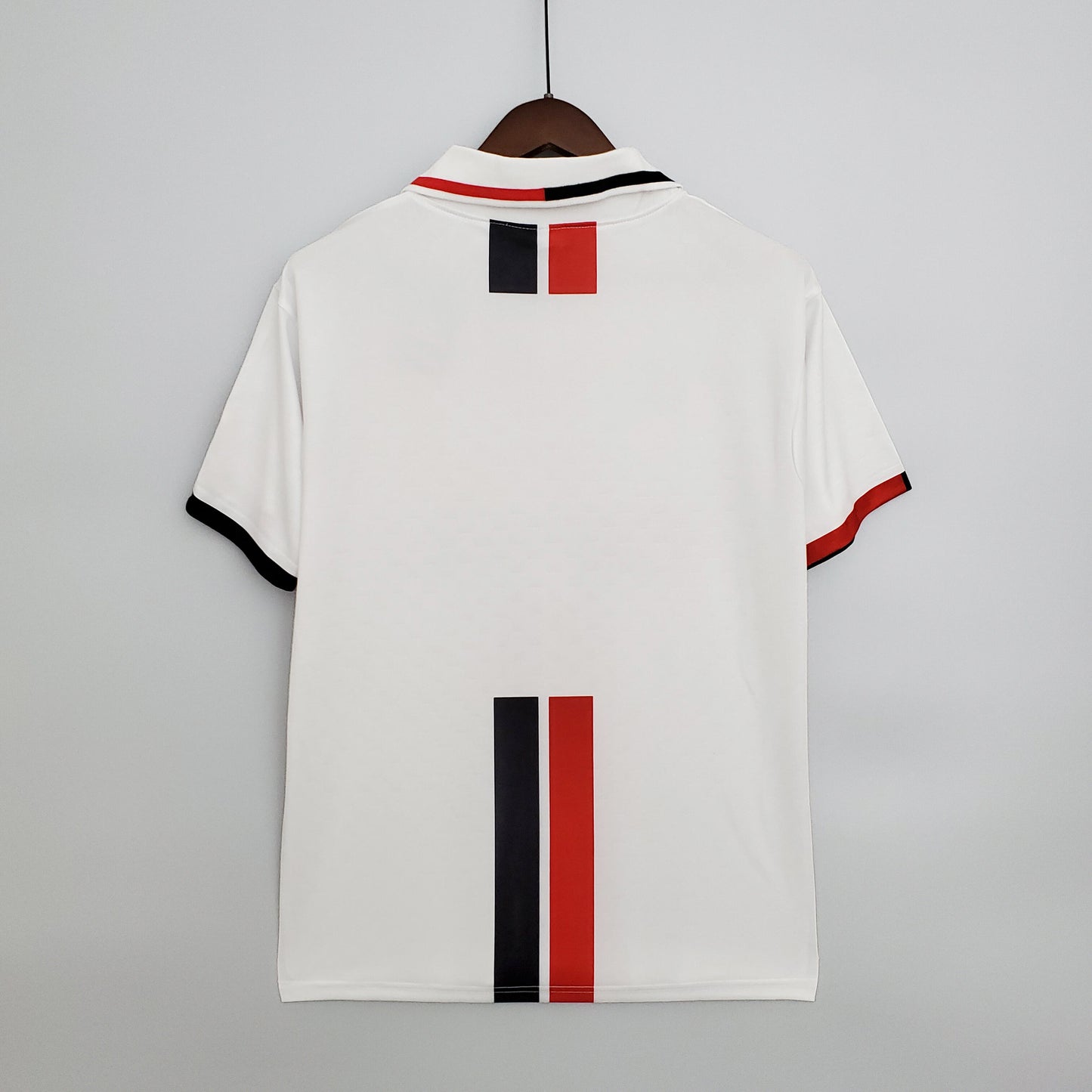 AC Milan “OPEL” 1994–95 — Camiseta away Lotto blanca (banda central rossonera)