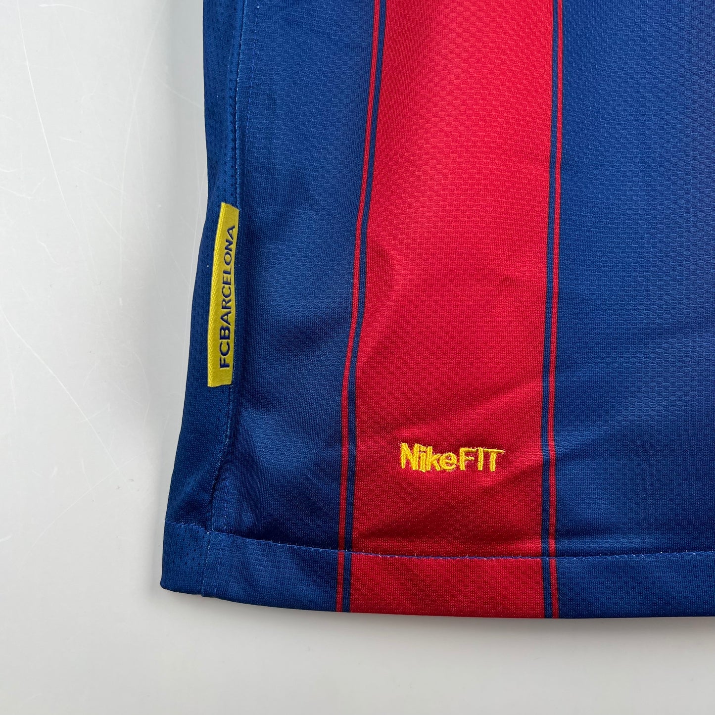 FC Barcelona “UNICEF” 2010–11 — Camiseta home Nike blaugrana (pinstripes)