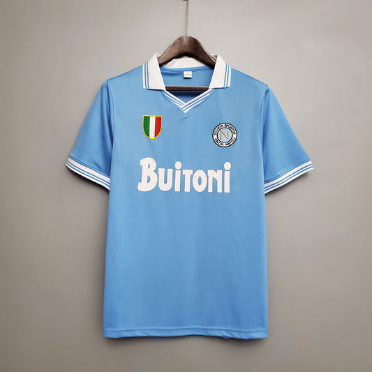 SSC Napoli “Buitoni” Scudetto 1987–88 — Camiseta home celeste (cuello blanco)