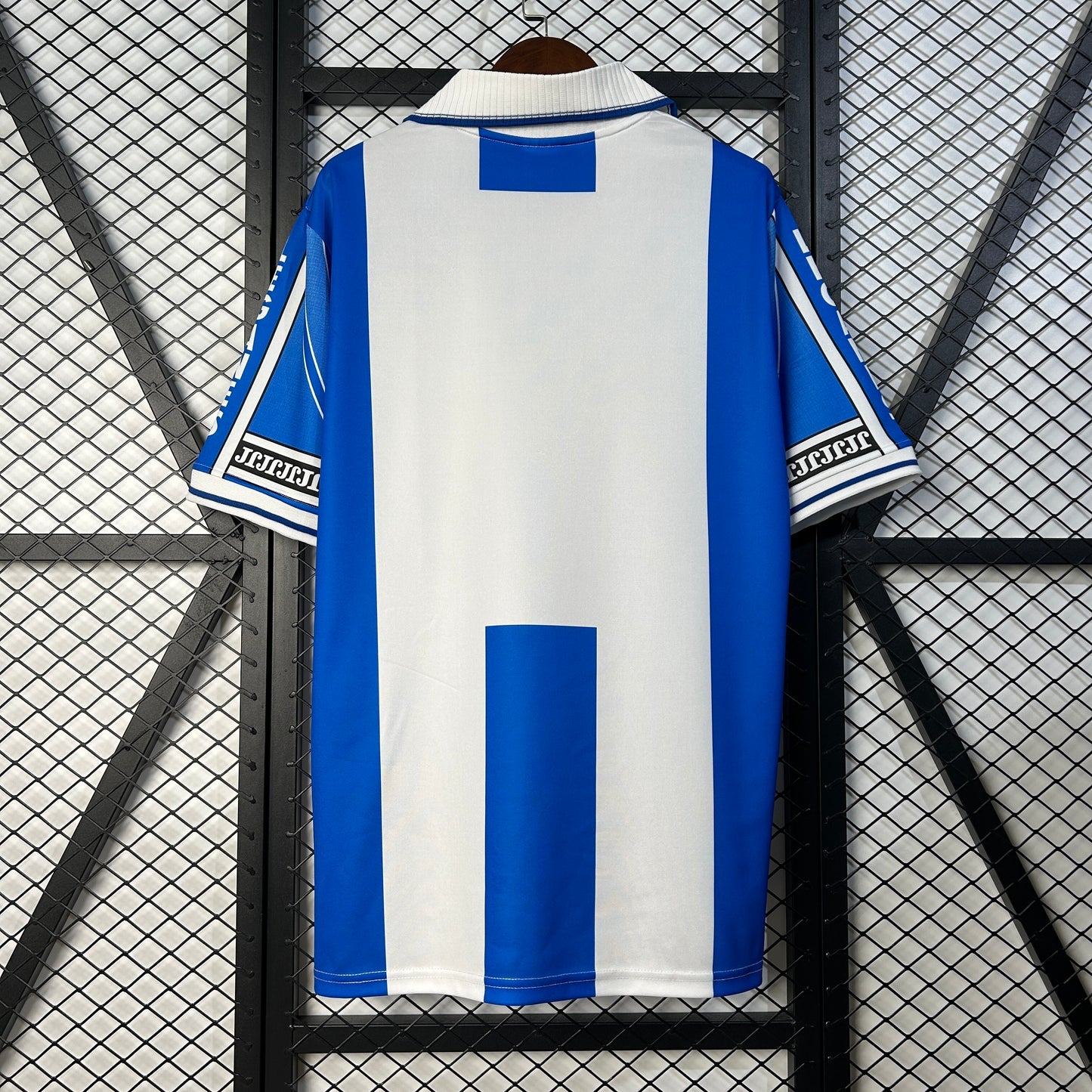 CD Leganés “OCASO” 1996–98 — Camiseta home Joma azul/blanca (cuello polo)