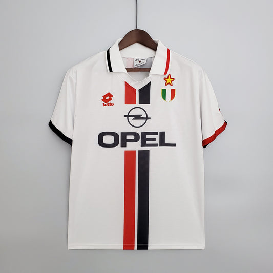 AC Milan “OPEL” 1994–95 — Camiseta away Lotto blanca (banda central rossonera)