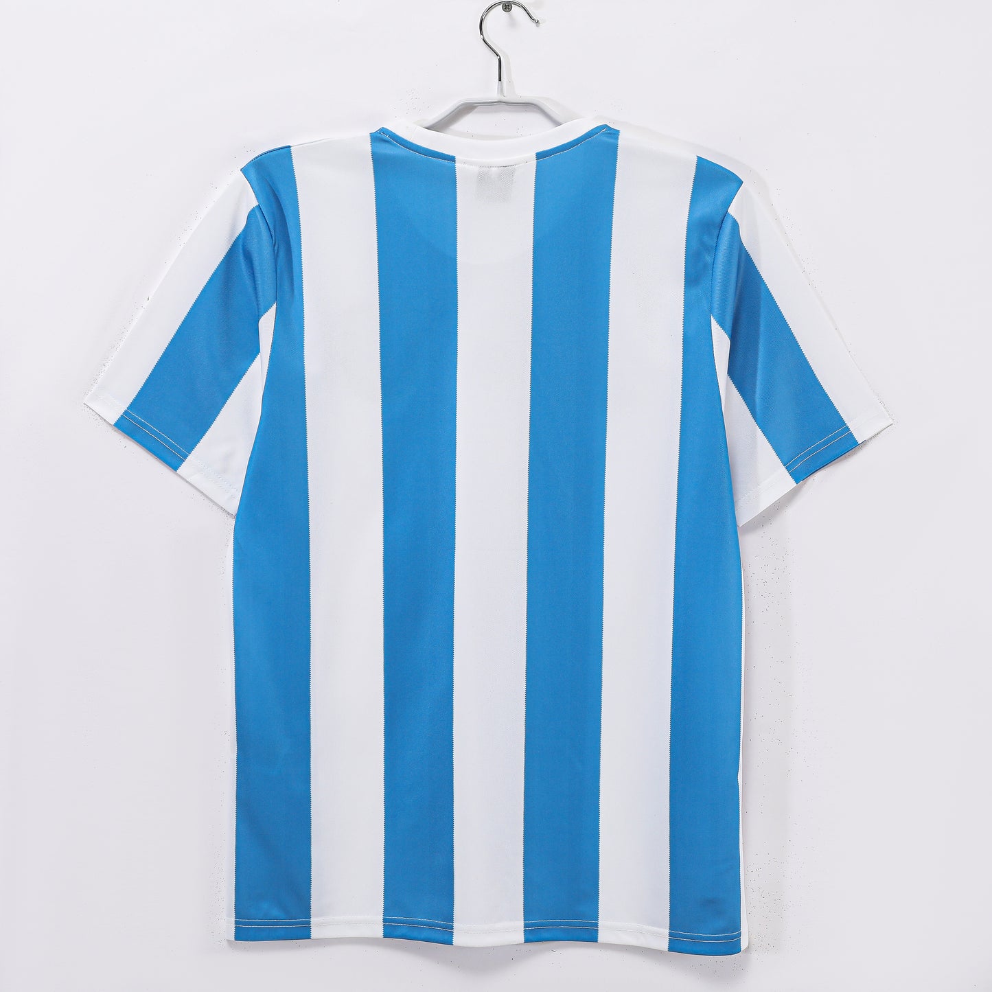 Camiseta Argentina Le Coq Sportif Local 1985–1987 (estilo Mundial 1986) – Rayas Celeste/Blanco