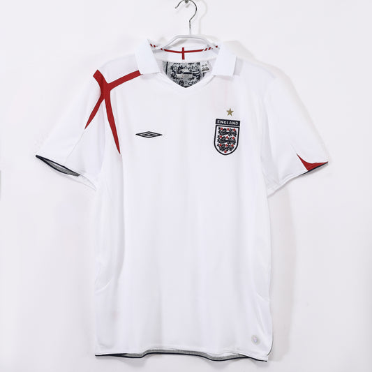 Camiseta Inglaterra Umbro Local 2006–2008 – Blanca con cruz roja (Mundial 2006)