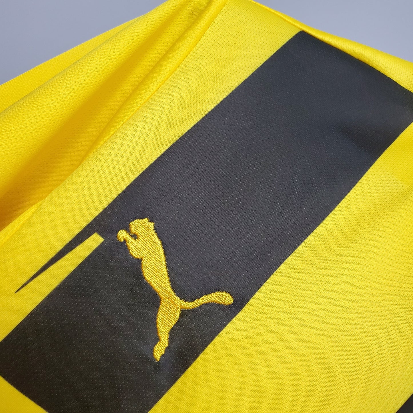 Borussia Dortmund “Evonik” 2016–17 — Camiseta home Puma amarilla/negra (rayas verticales)