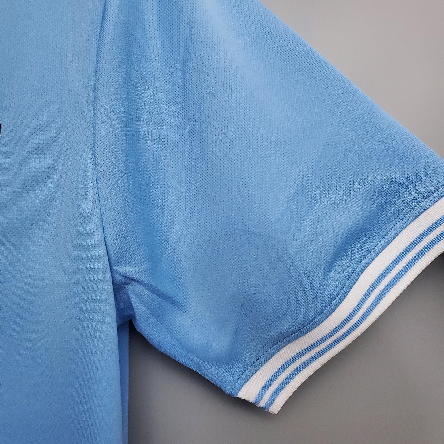 SSC Napoli “Buitoni” Scudetto 1987–88 — Camiseta home celeste (cuello blanco)