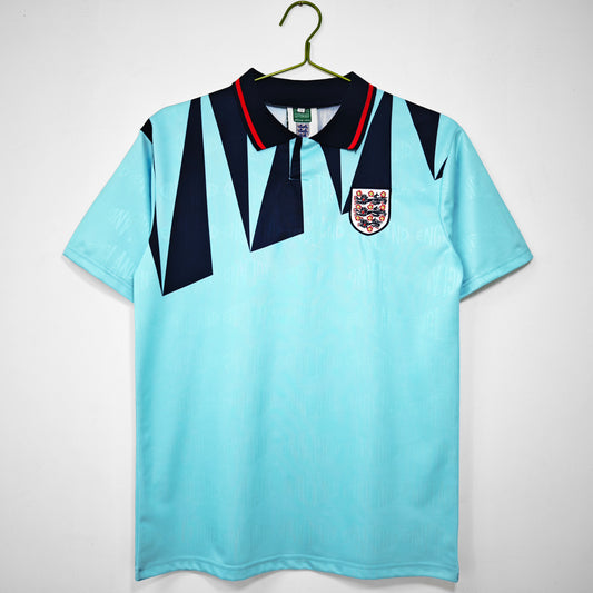 Camiseta Inglaterra Score Draw Retro – Third 1990–1992 “Ice Blue” | Celeste/Marino con cuello polo