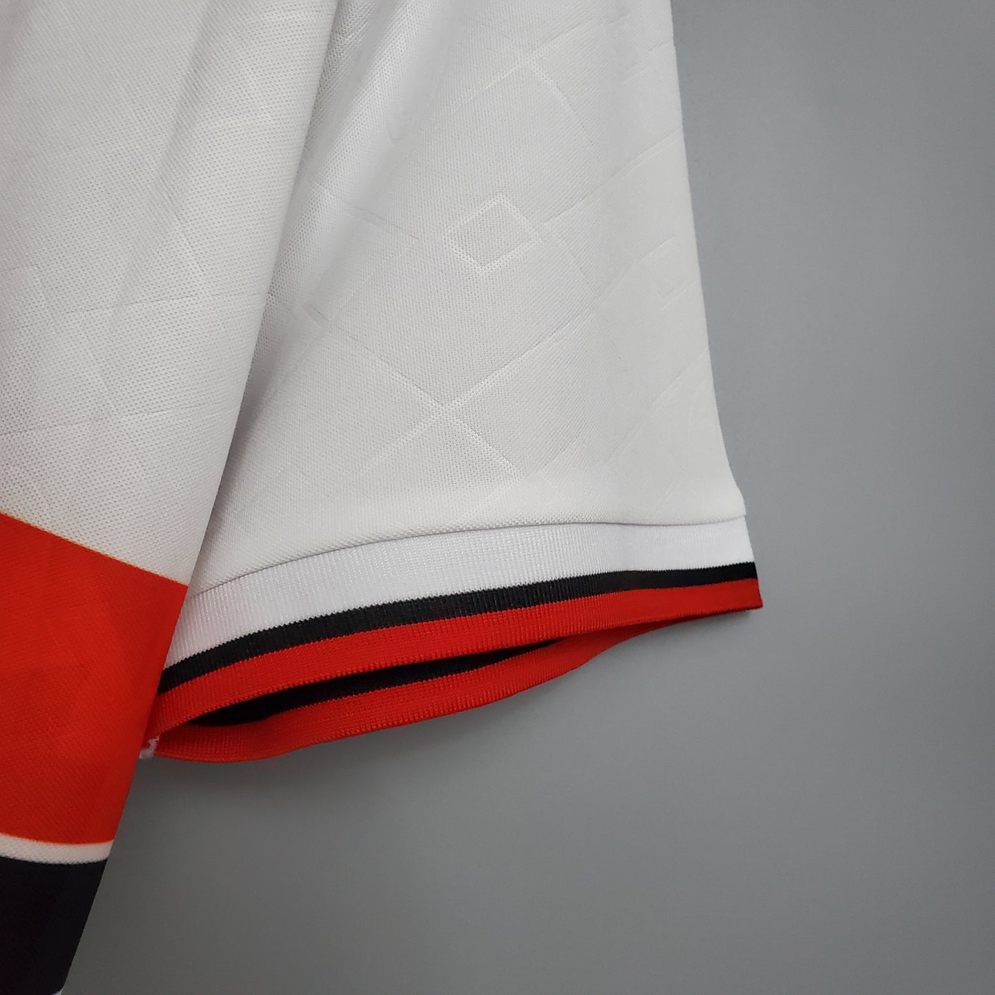 AC Milan “Motta” 1993–94 — Camiseta away Lotto blanca (banda roja)