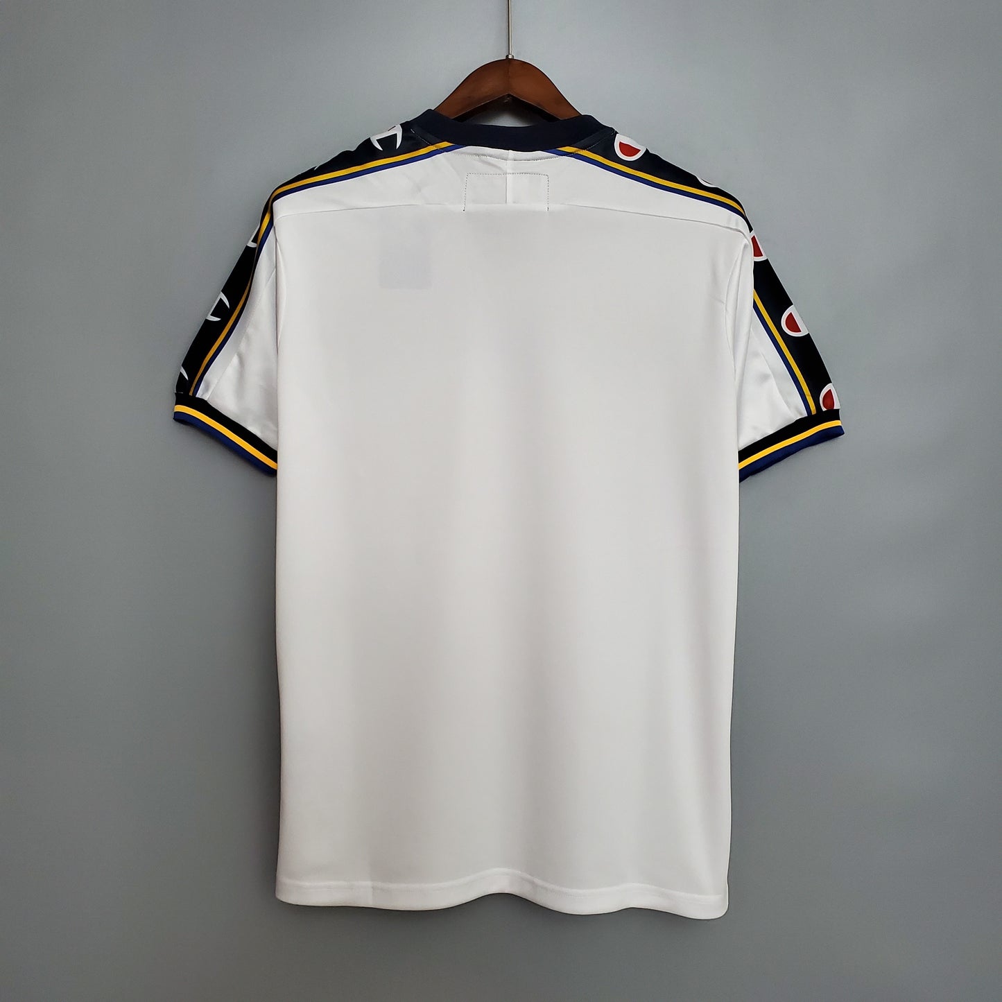 Parma “Parmalat” 1999–2001 — Camiseta away Champion blanca (franja azul)