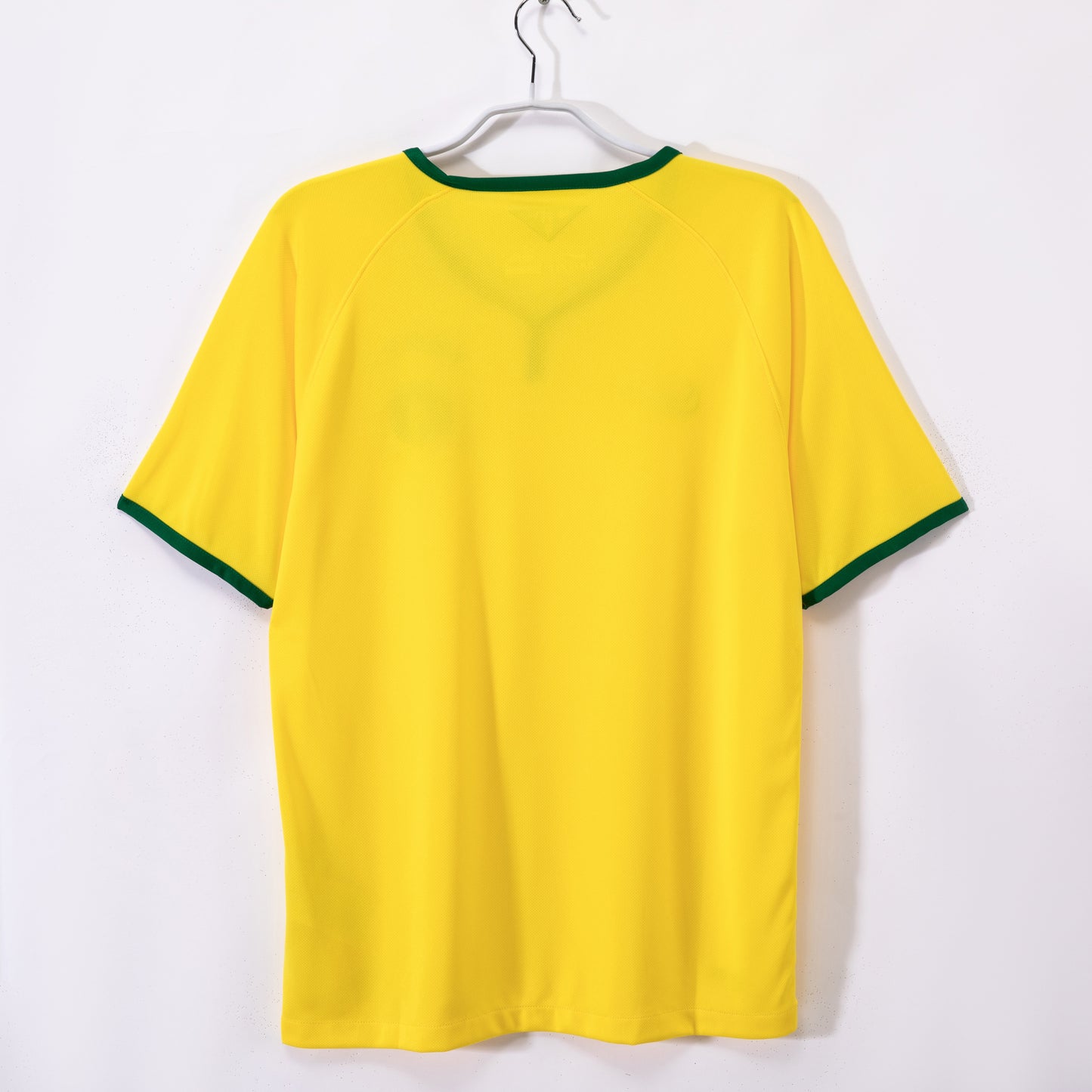 Camiseta Brasil Nike Local 2012/13 – Amarilla con cuello “notch” verde (Dri-FIT)