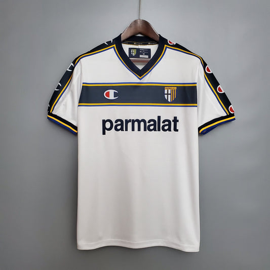 Parma “Parmalat” 1999–2001 — Camiseta away Champion blanca (franja azul)
