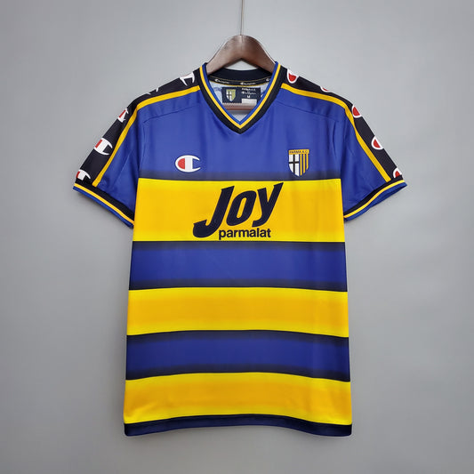 Parma “Joy Parmalat” 2000–01 — Camiseta home Champion amarilla/azul (rayas horizontales)