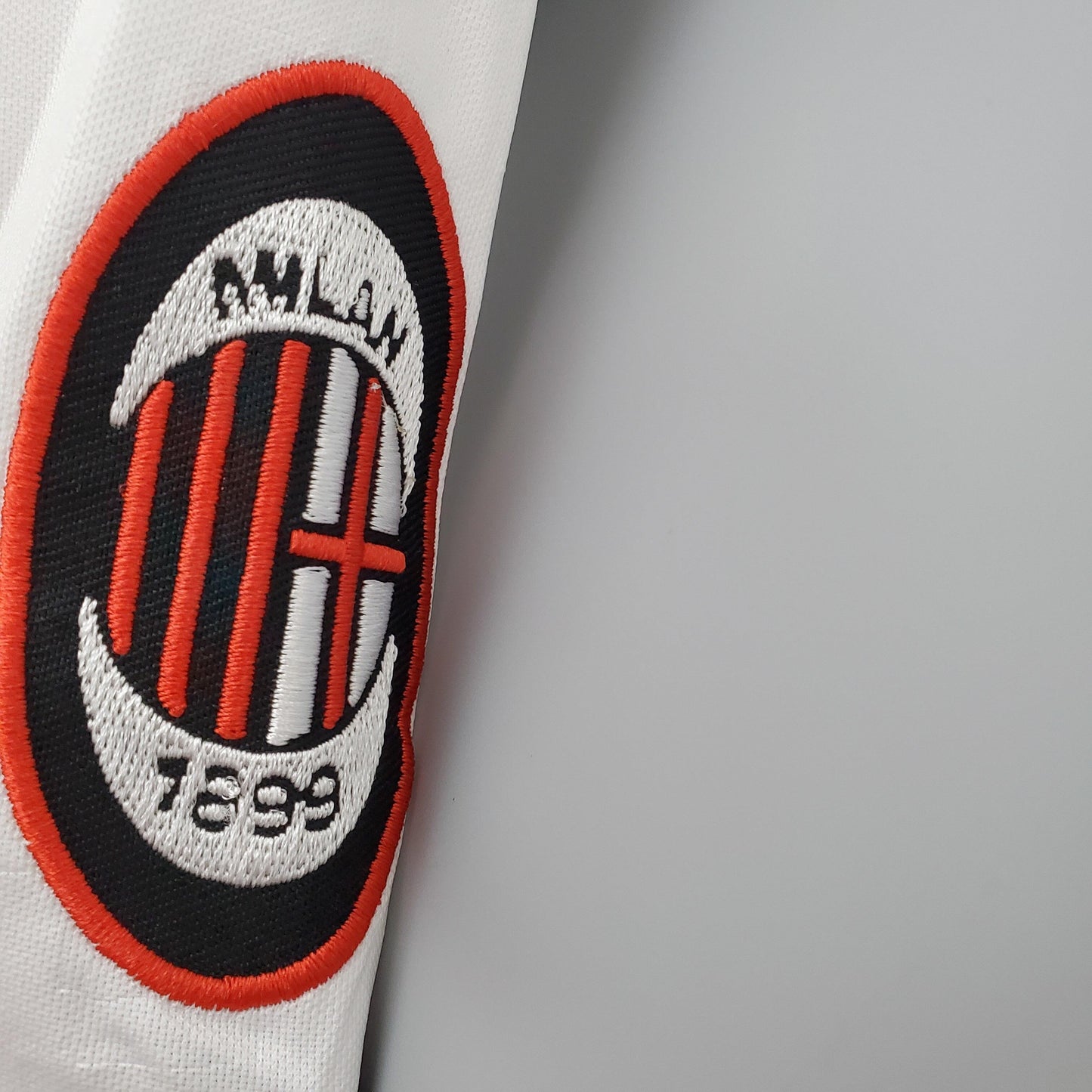 AC Milan “OPEL” 1994–95 — Camiseta away Lotto blanca (banda central rossonera)